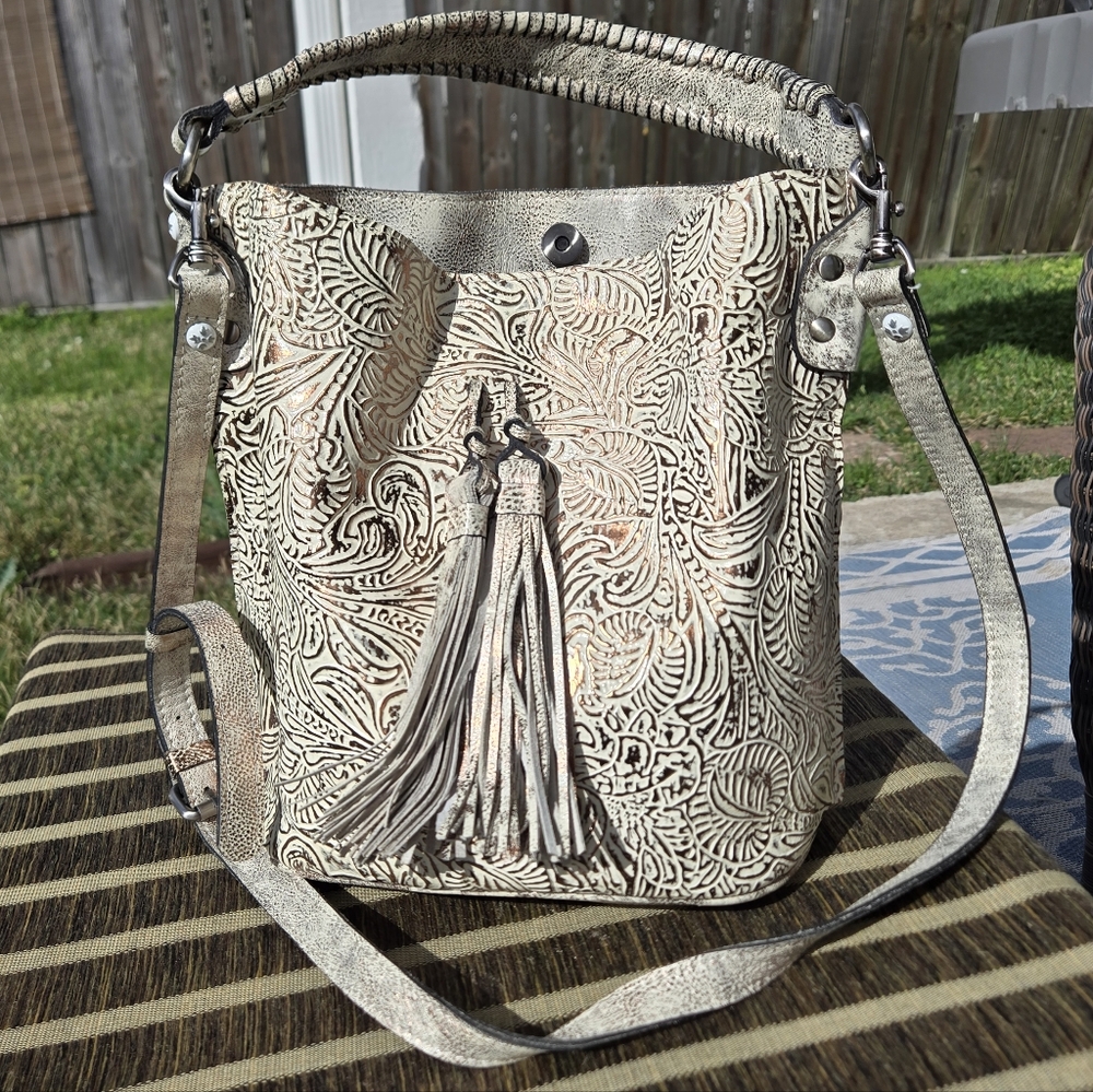 Patricia Nash Heritage Otavia Leather Bucket Bag in a biscuit and gold colorway